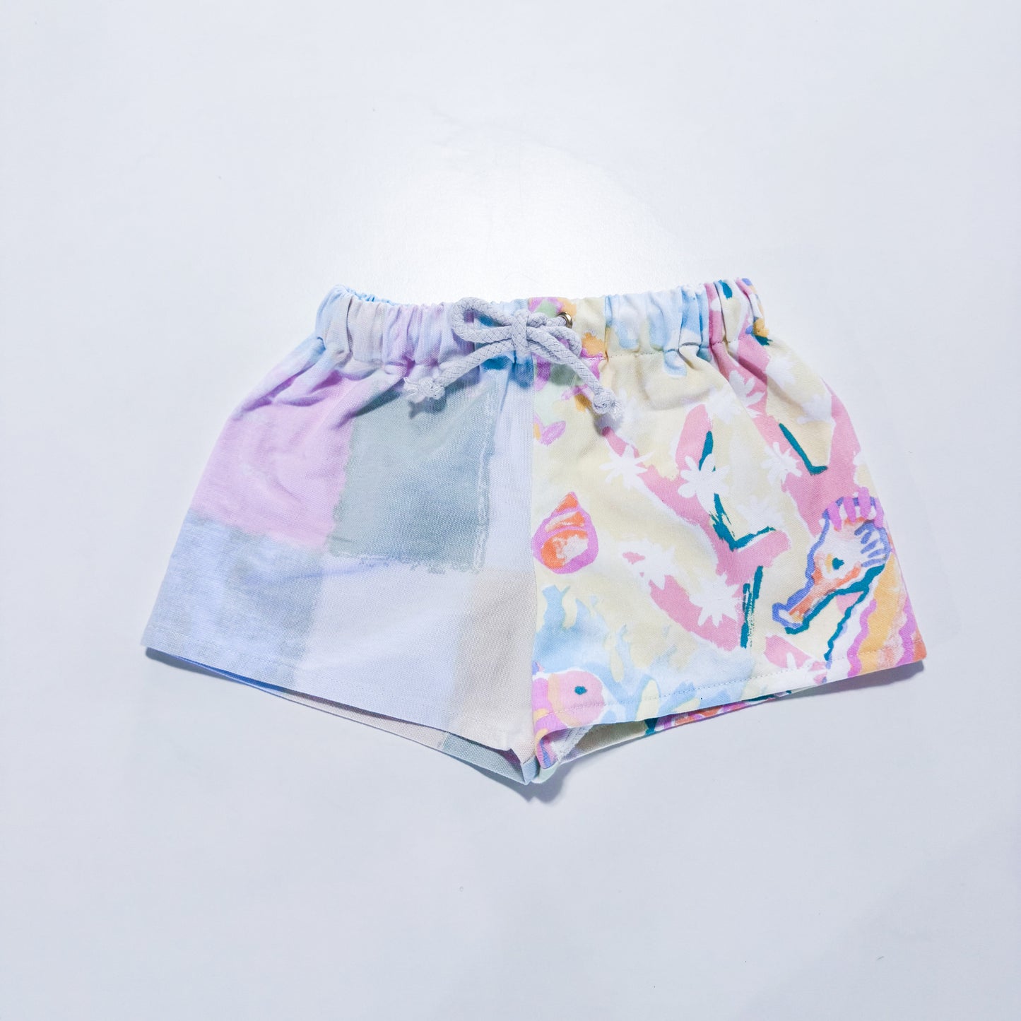 Upcycled seashore pastel shorts with rope tie