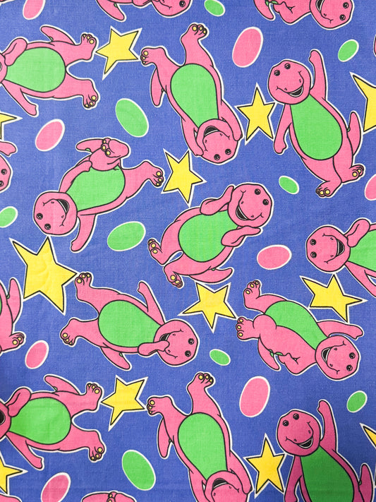 Star Struck Purple Dinosaur Fabric